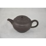 ***REOFFER IN DERBY AUGUST SALE £40/£60***  A Chinese Yxing ware teapot, in a dark brown glaze, with