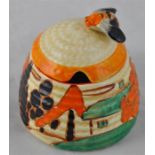 Clarice Cliff for Newport Pottery, a small Orange Trees and House (Alpine) beehive honey pot,