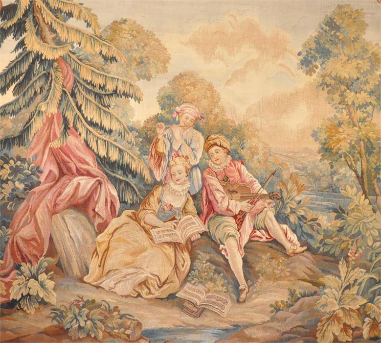 A large Aubusson tapestry, French 20th century, depicting a couple and musician within a forested