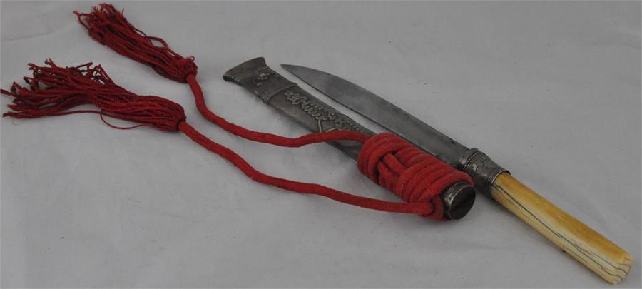 ***REOFFER IN DERBY AUGUST SALE £40/£60***  An antique Tibetan military sword, in a silver metal