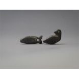 Mesopotamian Jemdet Nasr Fish and Bird Amulets, 3rd millennium BC A pair of black steatite amulets