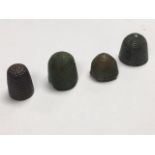 A group of 4 Medieval thimbles in good condition, fine detail. 16 - 23mm. Provenance: Ex. A. R