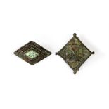 A pair of bronze enameled lozenge brooches in superb condition. Pins intact. From left: 50mm and