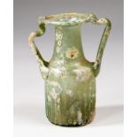 Roman glass vessel, 1st century AD.   A glass perfume vessel with flat disc shaped rim, tapering