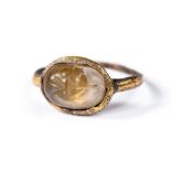 A stunning Roman ring with thin, round section band, C. 2nd - 3rd Century AD. The bezel with oval