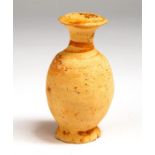 A buff pottery storage vessel decorated with ochre painted bands around the neck and rim. A few