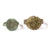 Viking Ring Pair, C. 9th -11th Century AD. A pair of bronze Viking rings with cylindrical and dotted