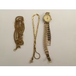 Two 18ct gold necklaces (one unmarked but tests as 18ct) and a 9ct cased lady's Rotary wristwatch