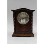 An early 20th Century oak cased eight day mantle clock,