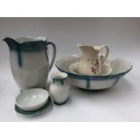 A toilet set comprising of jug and bowl,