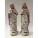 A pair of Continental Parian ware figures of Jesus and Our Lady (Sacred Hearts) stamped 1126,