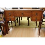 A mid 20th Century Queen style oak dressing table, made by Inglesants of Leicester,