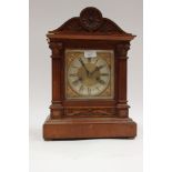 A bracket clock, Roman numerals to dial,