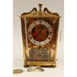 A brass Schatz 400 day mantle clock,