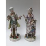 A pair of 19th Century figures in 18th Century style, German, some finger damage, 42 cm high/16.