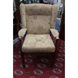 A pair of contemporary beige upholstered armchairs,