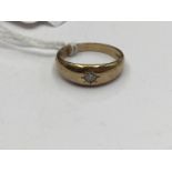 A 9ct gold ring star set with a small diamond, size approx U,