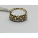 A diamond five stone ring, comprising graduated diamonds claw set in 18ct gold,