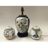 A pair of Chinese ginger jars, Qianlong style; together with a Chinese famille verte ginger jar,