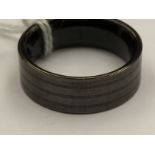 A tungsten ring with engraved linear pattern, gentleman's,