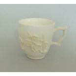 A Bow Blanc de Chine Coffee Cup With a Raised Prunus Root Pattern Circa 1750 - 1755 Size 5.