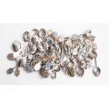 A large quantity of various silver plated souvenir spoons, from various resorts,