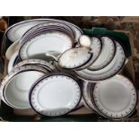 A late Victorian/Edwardian white ground and blue border dinner set, comprising tureen, platter,