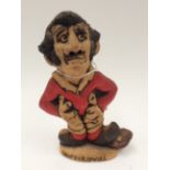 'Drop Kick Davies' figure, signed to base by the artist John Hughes,