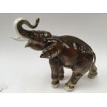 A Royal Dux Elephant figure in olive green (af)