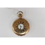 A gold-plated half hunter pocket watch, subsidiary seconds dial,