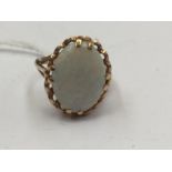 A 9ct gold opal single stone ring