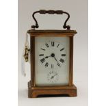 A brass carriage clock, early 20th Century,