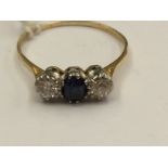 A sapphire and diamond three stone ring, 2.