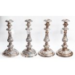 A set of four early Victorian Old Sheffield plate candlesticks,