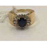 A sapphire diamond cluster ring (diamond missing)