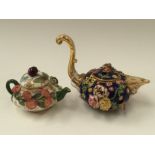 A Derby miniature teapot, encrusted with flowers,