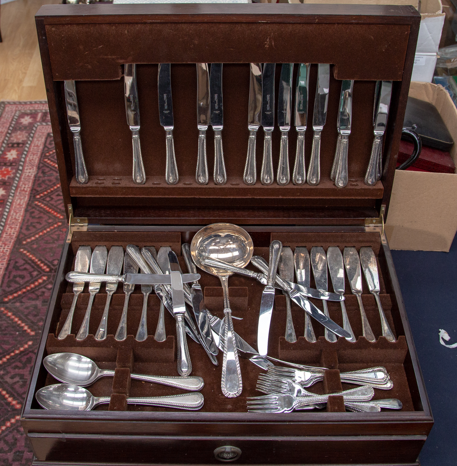A comprehensive boxed set of silver plated cutlery for twelve,