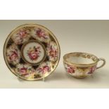 A porcelain tea cup and Saucer,