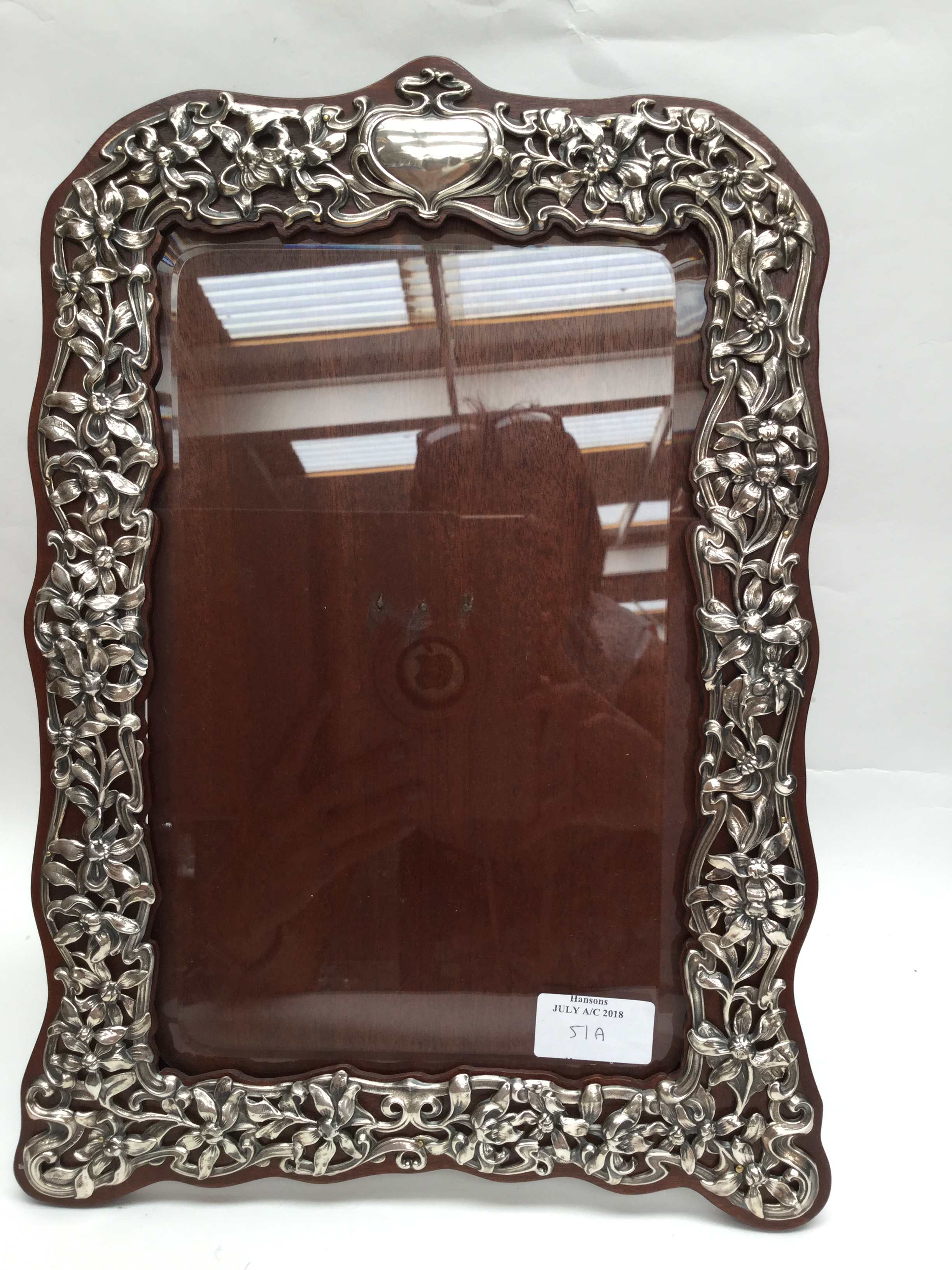 A large silver Art Nouveau frame made by William Comyns with hallmarks for London 1903 with