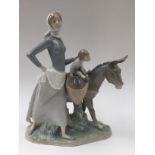 Lladro 'Woman with Child with Donkey' figurine,