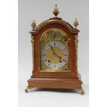A W and H oak cased eight day oak bracket clock, silver chapter ring, gilt spandrels, gilt finial's,