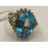 A 14k topaz and diamond cluster ring,