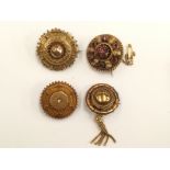 A Victorian gold target brooch, set old-cut diamond to the centre,