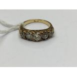 A Victorian five stone diamond ring, the centre old cut diamond of approx 0.