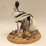 An Arocets and Chicks Renaissance figure group, signed 'H Clark 1978',