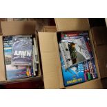 Four boxes of military interest DVD's, particularly aircraft studies,