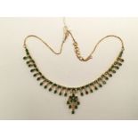 An 18ct yellow gold emerald and diamond collaret drop-fringe necklace,