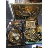 Brass ware, two boxes of assorted brass ware to include trivets, skimmers, kettle and stand, pans,