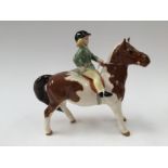 Beswick girl on Skewbad pony,