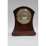 An Edwardian mahogany cased clock, inlay to front, Arabic numerals to dial,